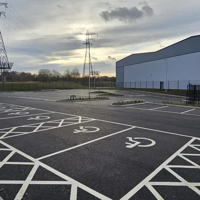 Completed commercial car park with accessible parking bay markings