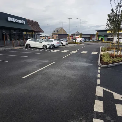 Retail park car park surfacing outside restaurant units